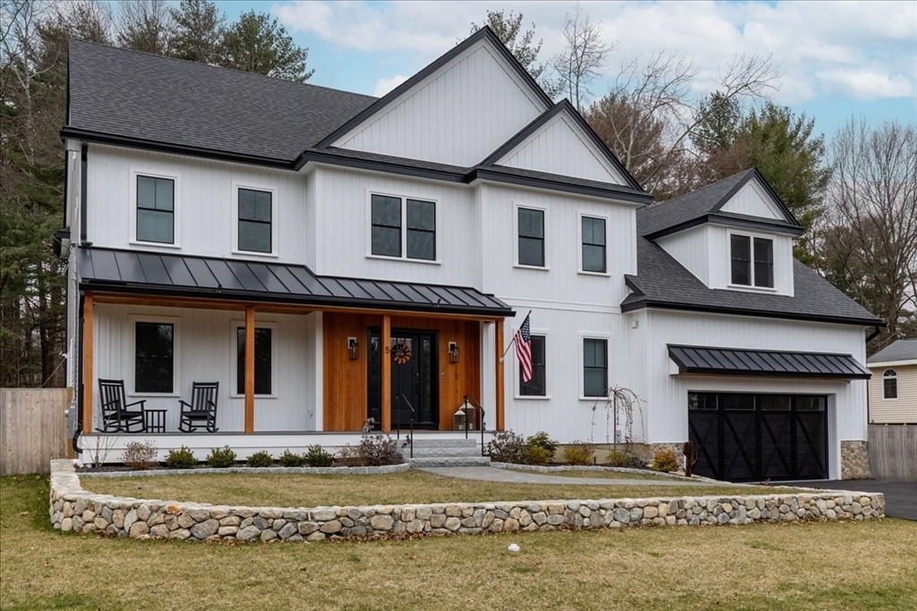 5 Brookside Lane Burlington, MA 01803 - Photo 2 of 42 a front view of a house with a yard