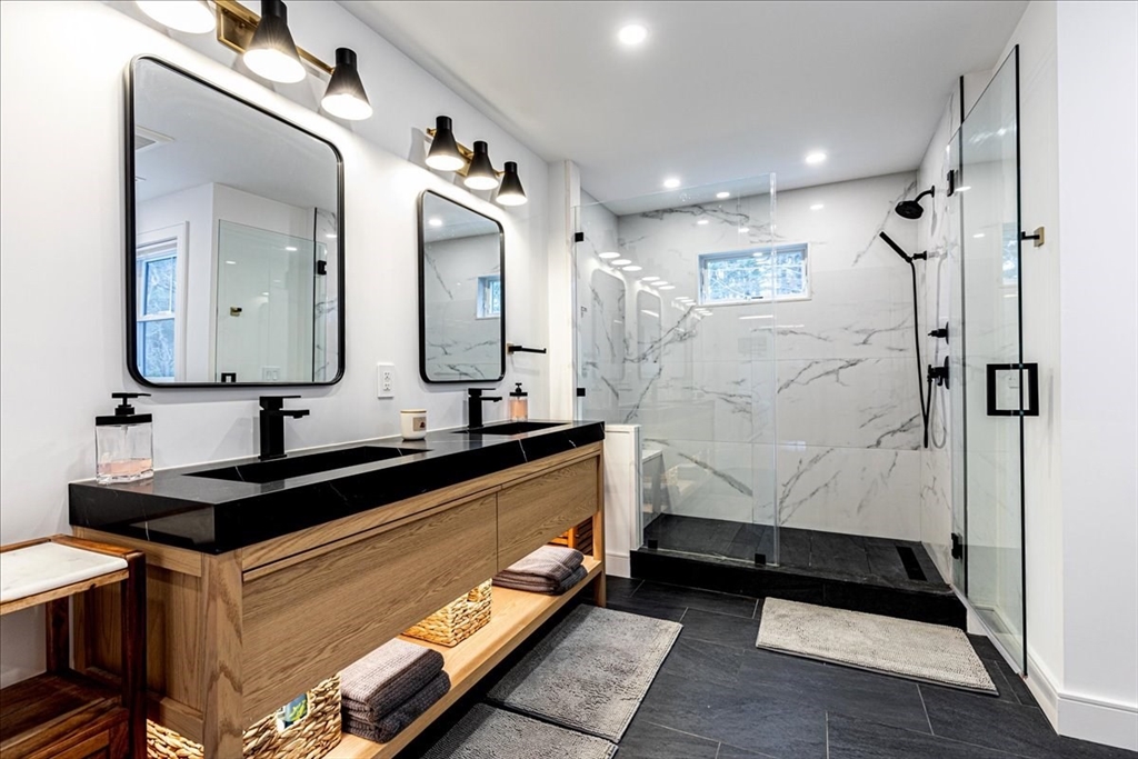 5 Brookside Lane Burlington, MA 01803 - Photo 22 of 42 a bathroom with a sink a double vanity and a mirror