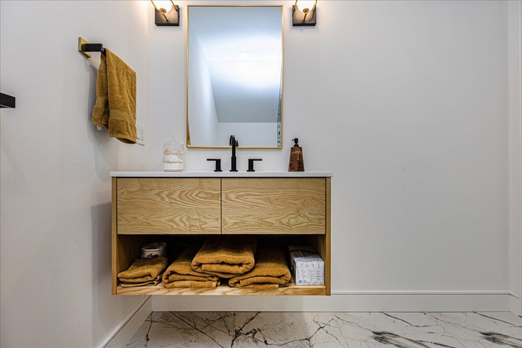 5 Brookside Lane Burlington, MA 01803 - Photo 28 of 42 a bathroom with a sink and a mirror