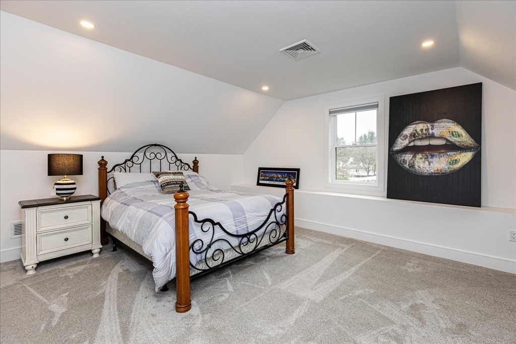 5 Brookside Lane Burlington, MA 01803 - Photo 29 of 42 a bedroom with a bed and window