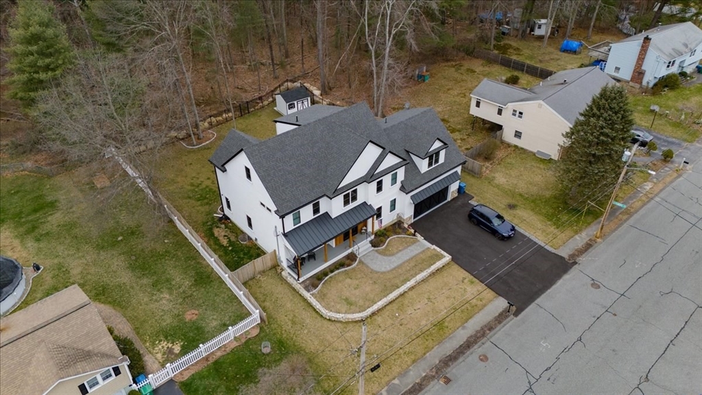 5 Brookside Lane Burlington, MA 01803 - Photo 40 of 42 an aerial view of a house with pool