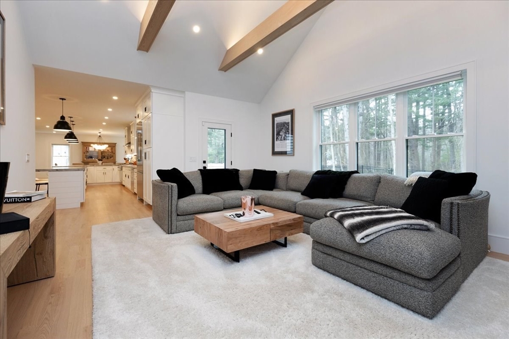 5 Brookside Lane Burlington, MA 01803 - Photo 7 of 42 a living room with furniture and a large window