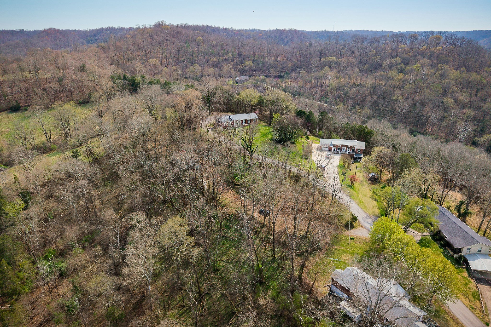 303 East Hill Road Gainesboro, TN 38562 - Photo 4 of 18 a view of a city with lush green forest