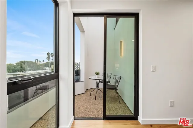 a view of a living room and bathroom