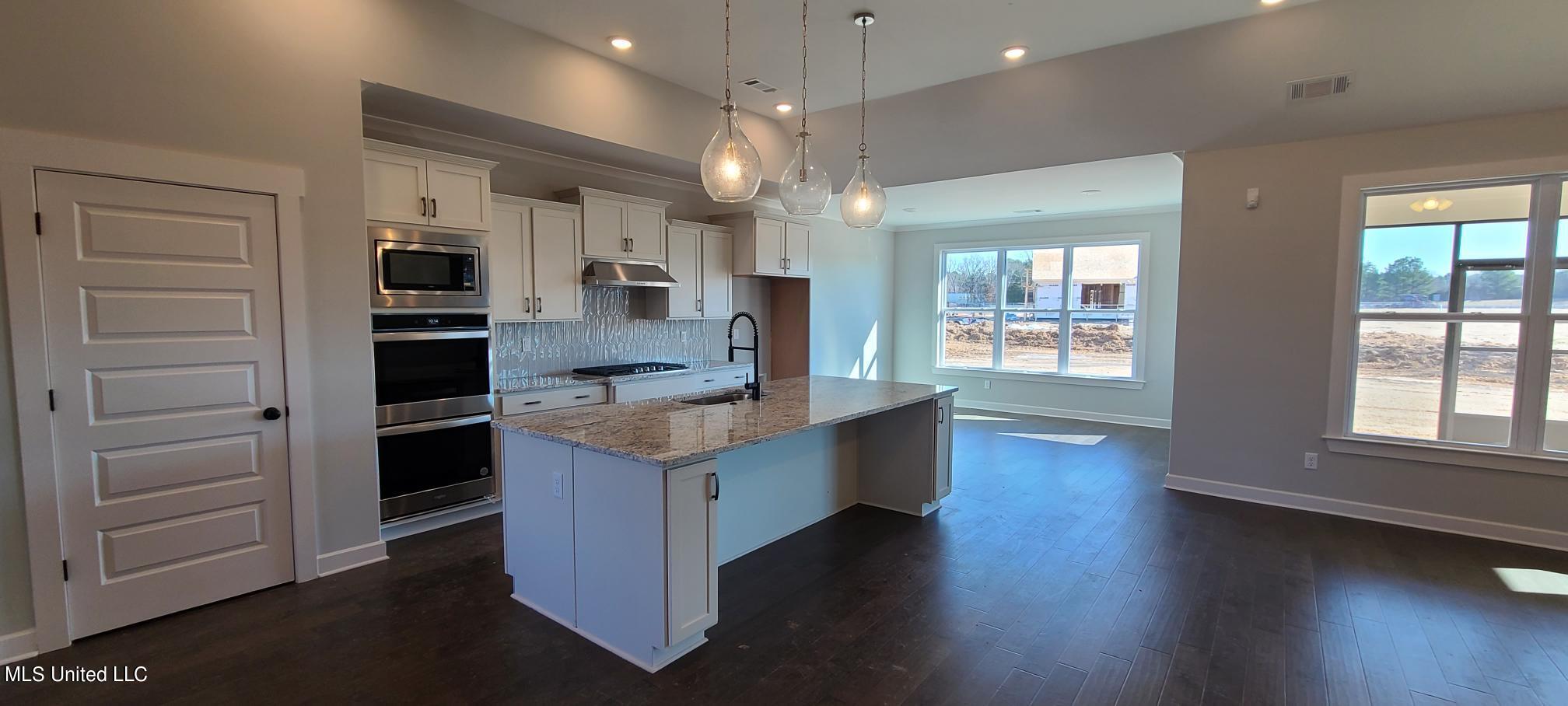 448 Ruskin Loop Hernando, MS 38632 - Photo 4 of 32 Kitchen to Sunroom