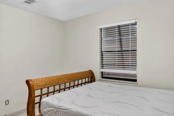 a view of a room with a large window