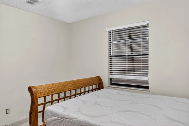 a view of a room with a large window