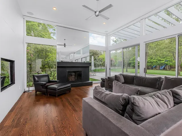 an aerial view of a house with a garden