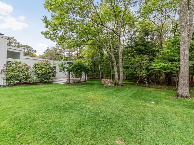 a view of a backyard with a garden