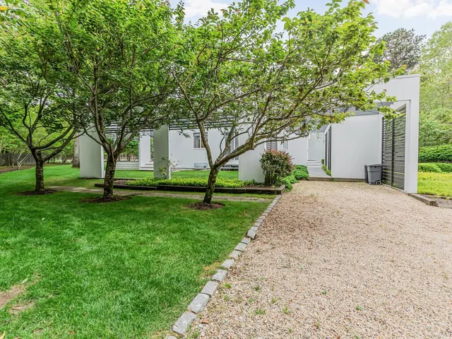 a view of a backyard with a garden