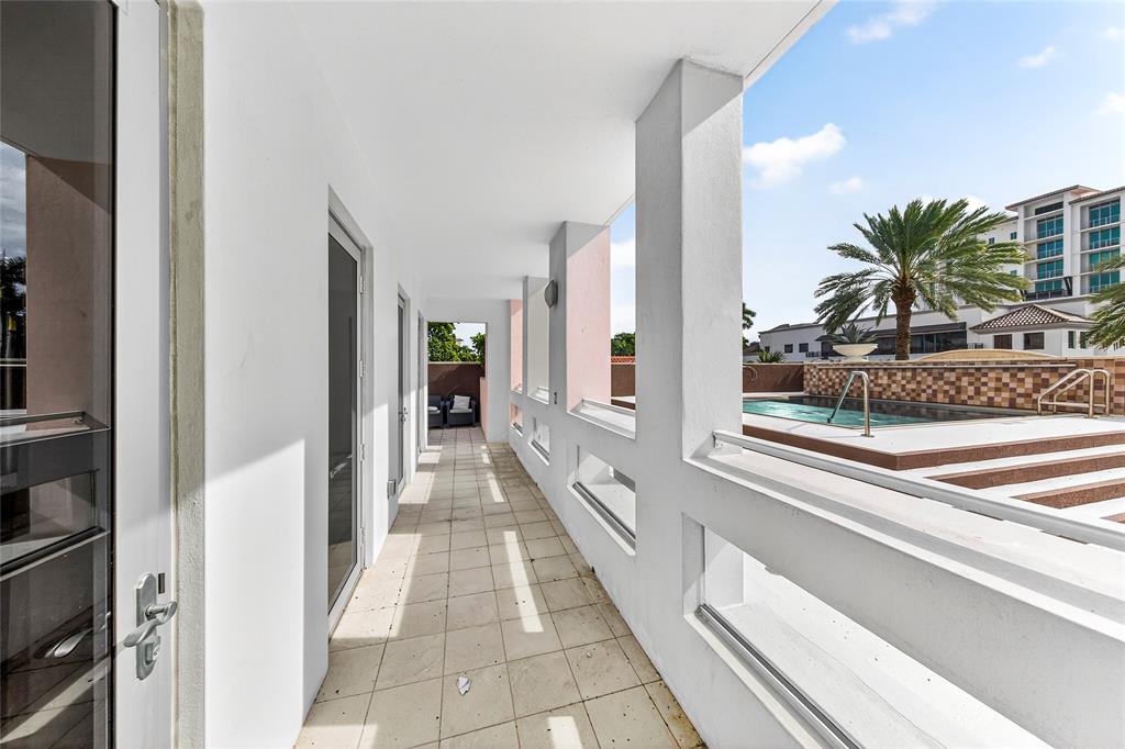 455 East Palmetto Park Road, Unit 2E Boca Raton, FL 33432 - Photo 24 of 59 a view of a bathroom with sink and shower