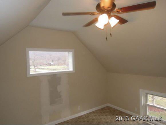 428 Beech Grove Road Roseland, VA 22967 - Photo 11 of 18 en empty room with a window
