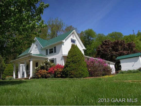 428 Beech Grove Road Roseland, VA 22967 - Photo 2 of 18 a front view of house with a garden