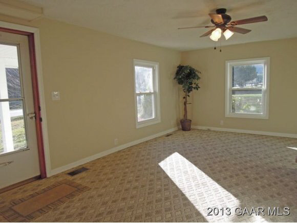 428 Beech Grove Road Roseland, VA 22967 - Photo 6 of 18 a living room with couch and window