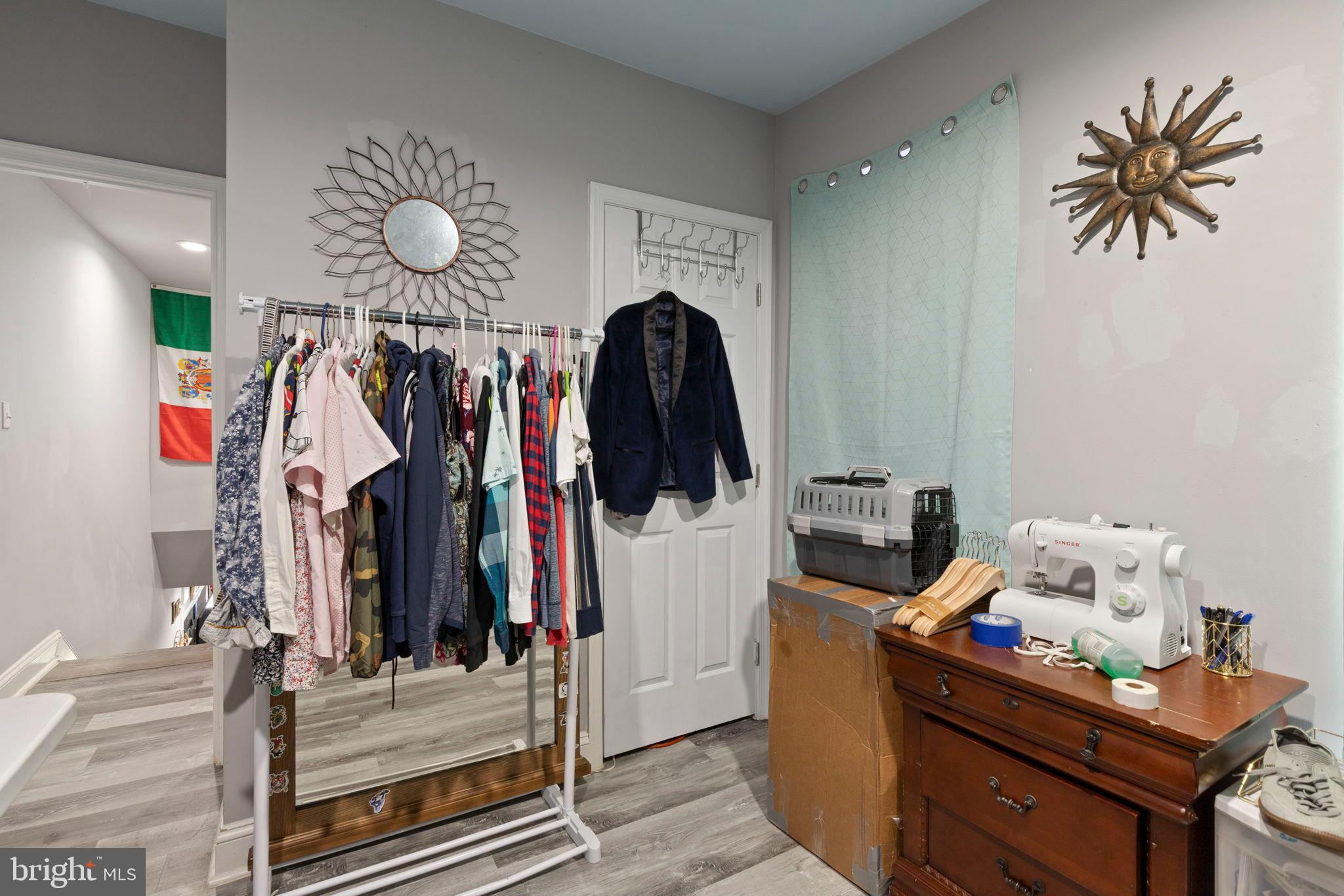 406 South Smallwood Street Baltimore, MD 21223 - Photo 16 of 18 a living room with furniture and a window