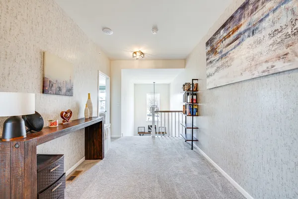a view of room with furniture and cabinet