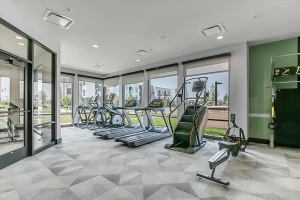 a view of a livingroom with furniture and a flat screen tv