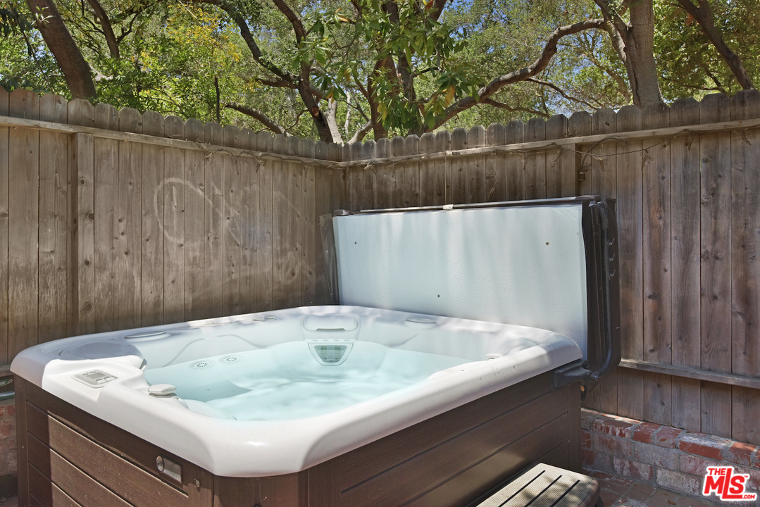 6138 Ramirez Canyon Road Malibu, CA 90265 - Photo 29 of 42 a sink sitting in a bathroom next to a yard