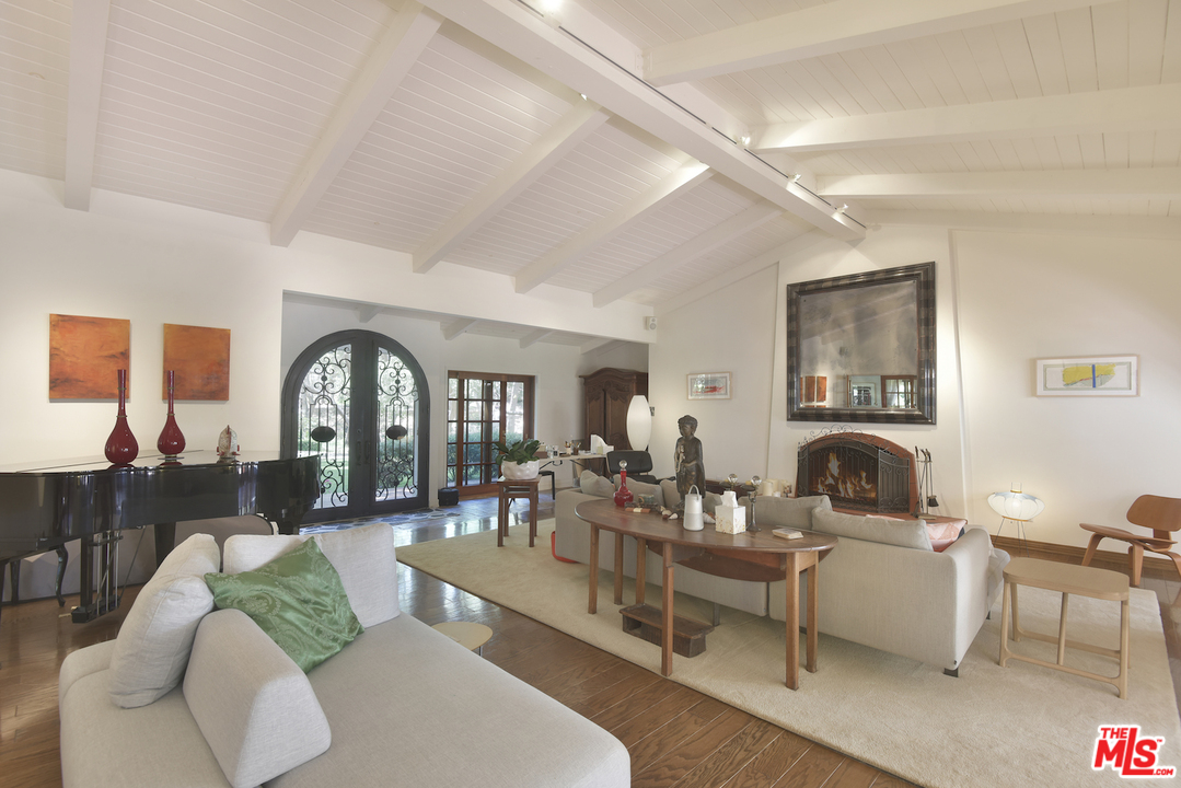 6138 Ramirez Canyon Road Malibu, CA 90265 - Photo 6 of 42 a living room with furniture and a large window