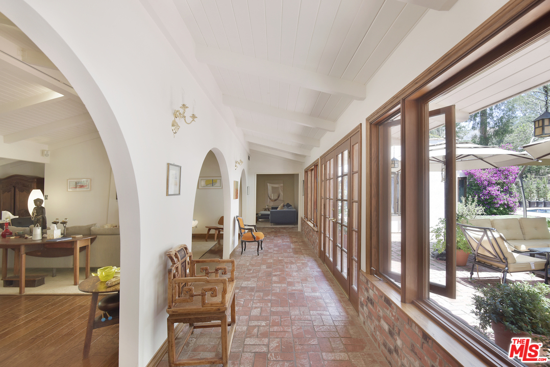 6138 Ramirez Canyon Road Malibu, CA 90265 - Photo 9 of 42 a view of a hallway with living room