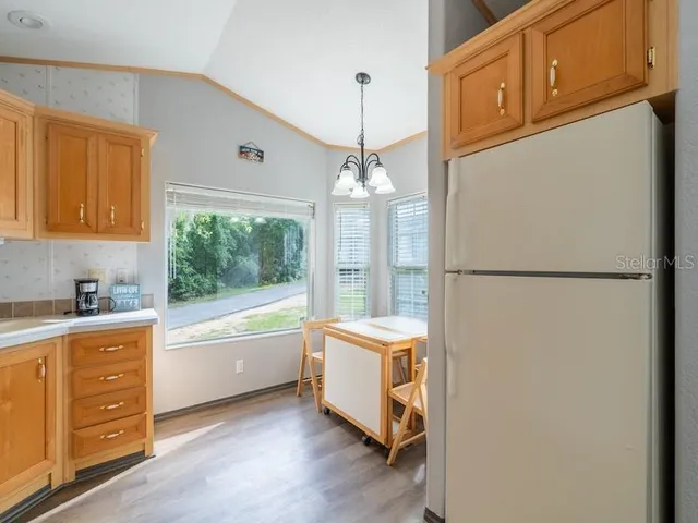 a bathroom with a tub sink and shower