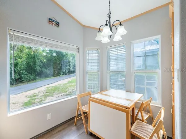 a view of a room with a large window