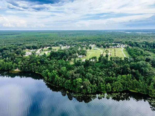 a view of a lake with a city