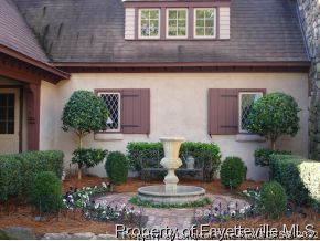 301 Summertime Road Fayetteville, NC 28303 - Photo 2 of 25 a front view of a house with garden