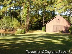 301 Summertime Road Fayetteville, NC 28303 - Photo 21 of 25 a view of a big room with a garden and plants