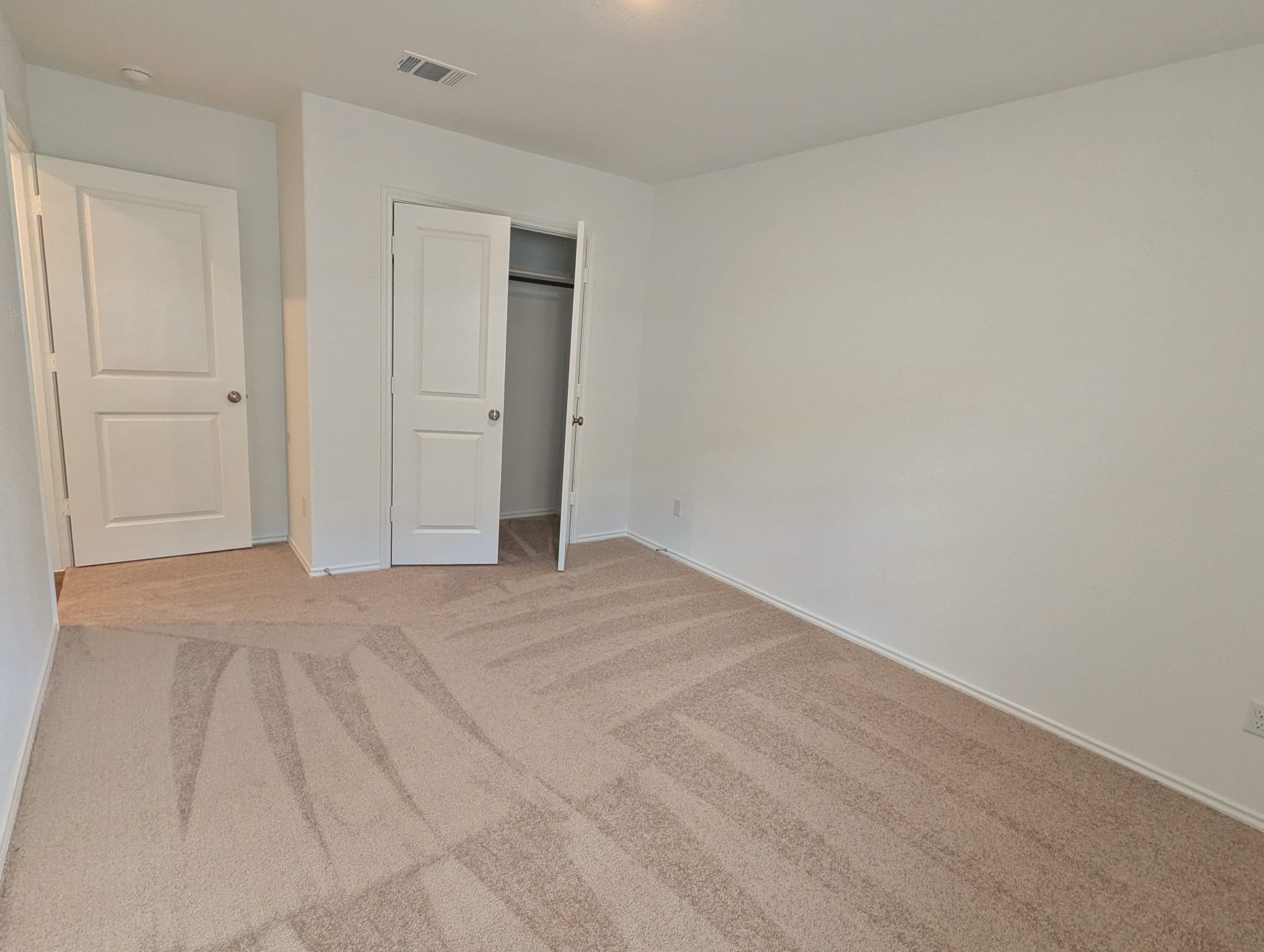 1504 Marley Kyle, TX 78640 - Photo 17 of 28 Unfurnished bedroom featuring carpet flooring and a closet