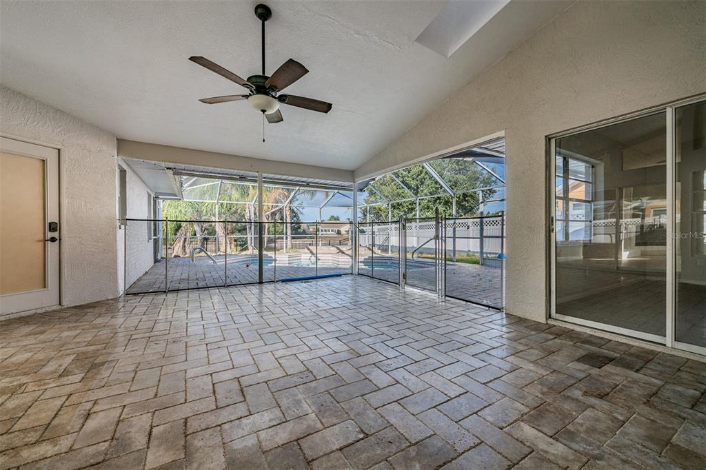5315 Saltamonte Drive New Port Richey, FL 34655 - Photo 13 of 26 a view of empty room with wooden floor and fan