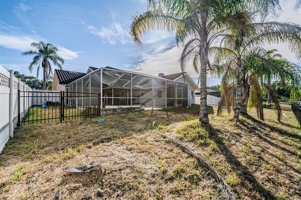 5315 Saltamonte Drive New Port Richey, FL 34655 - Photo 23 of 26 a view of a house with a yard