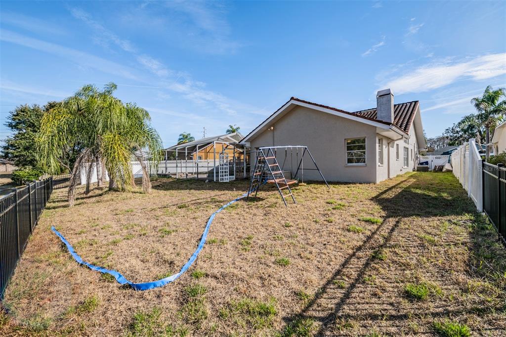 5315 Saltamonte Drive New Port Richey, FL 34655 - Photo 24 of 26 a view of a house with a yard