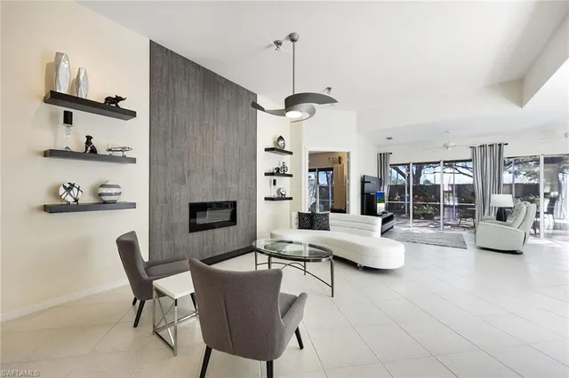 a living room with furniture and a table