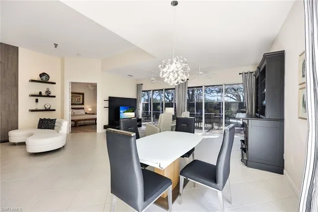 a kitchen with stainless steel appliances kitchen island granite countertop a sink and cabinets