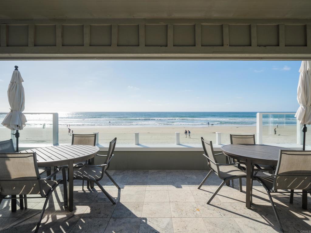 1812 Ocean Front Del Mar, CA 92014 - Photo 4 of 21 a view of table and chairs in the kitchen
