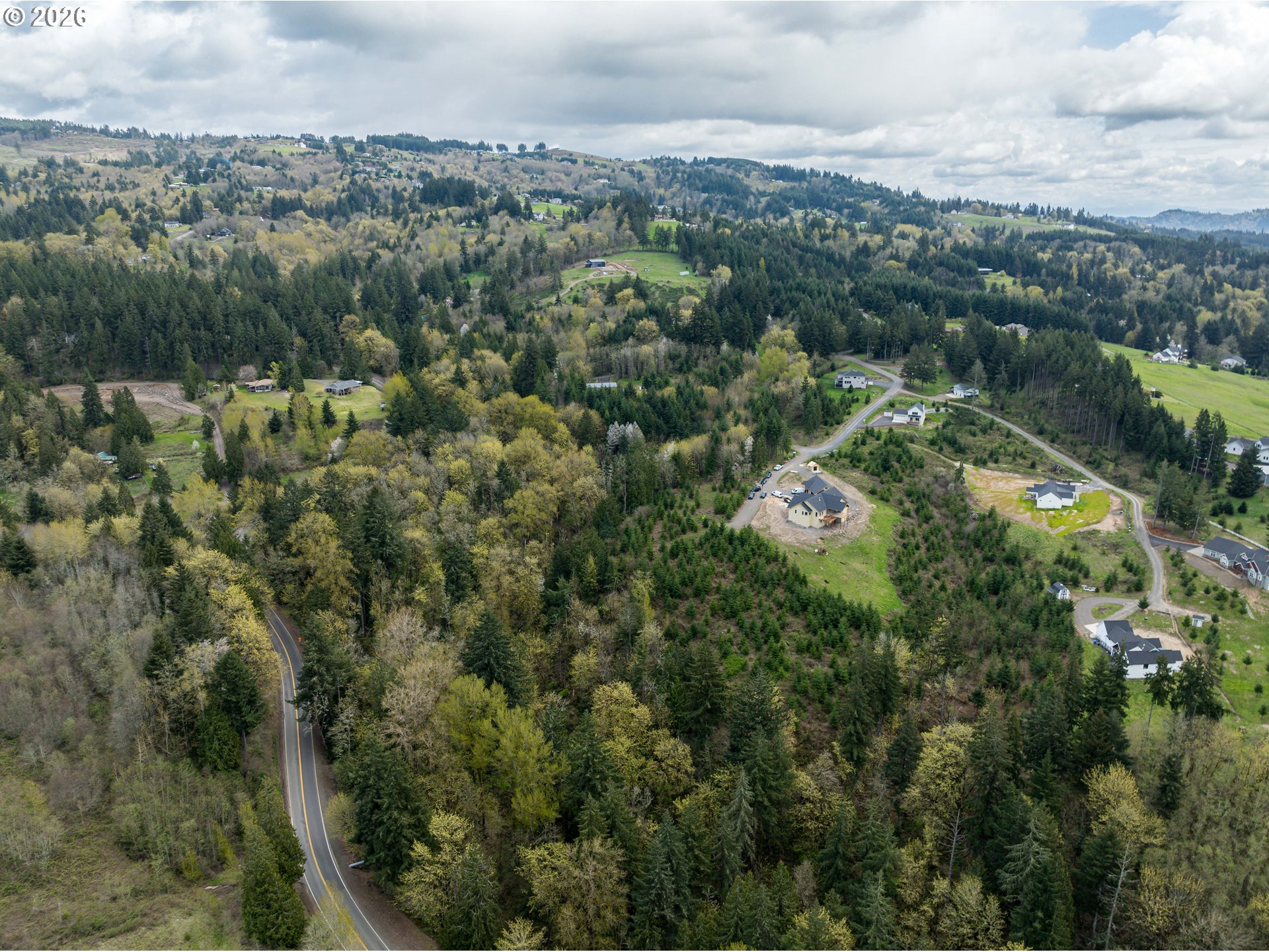 577 Martins Bluff Road Kalama, WA 98625 - Photo 3 of 13 an aerial view of residential houses with outdoor space and trees