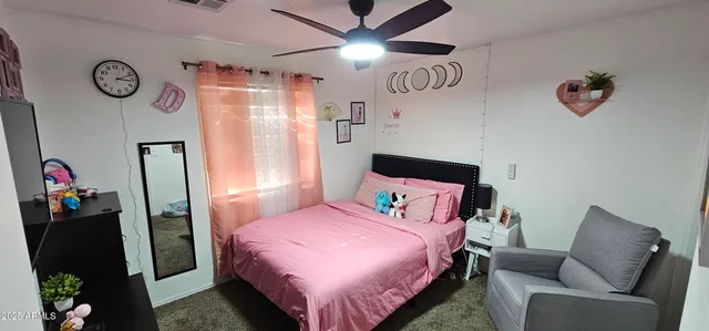 a bed room with a bed and a couch