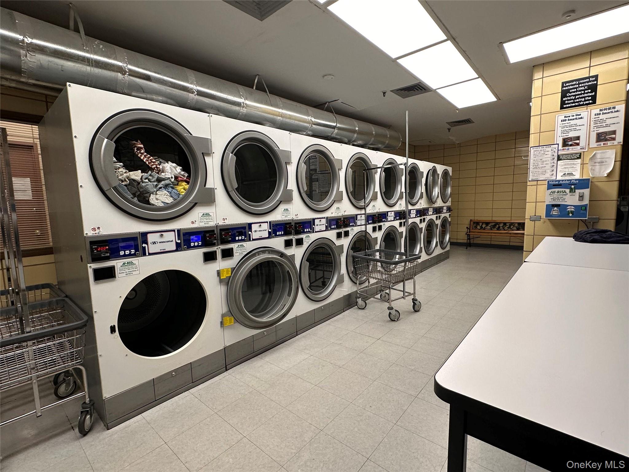 41-40 Union Street, Unit 16M Queens, NY 11355 - Photo 11 of 12 Coin operated dryers in the building.
