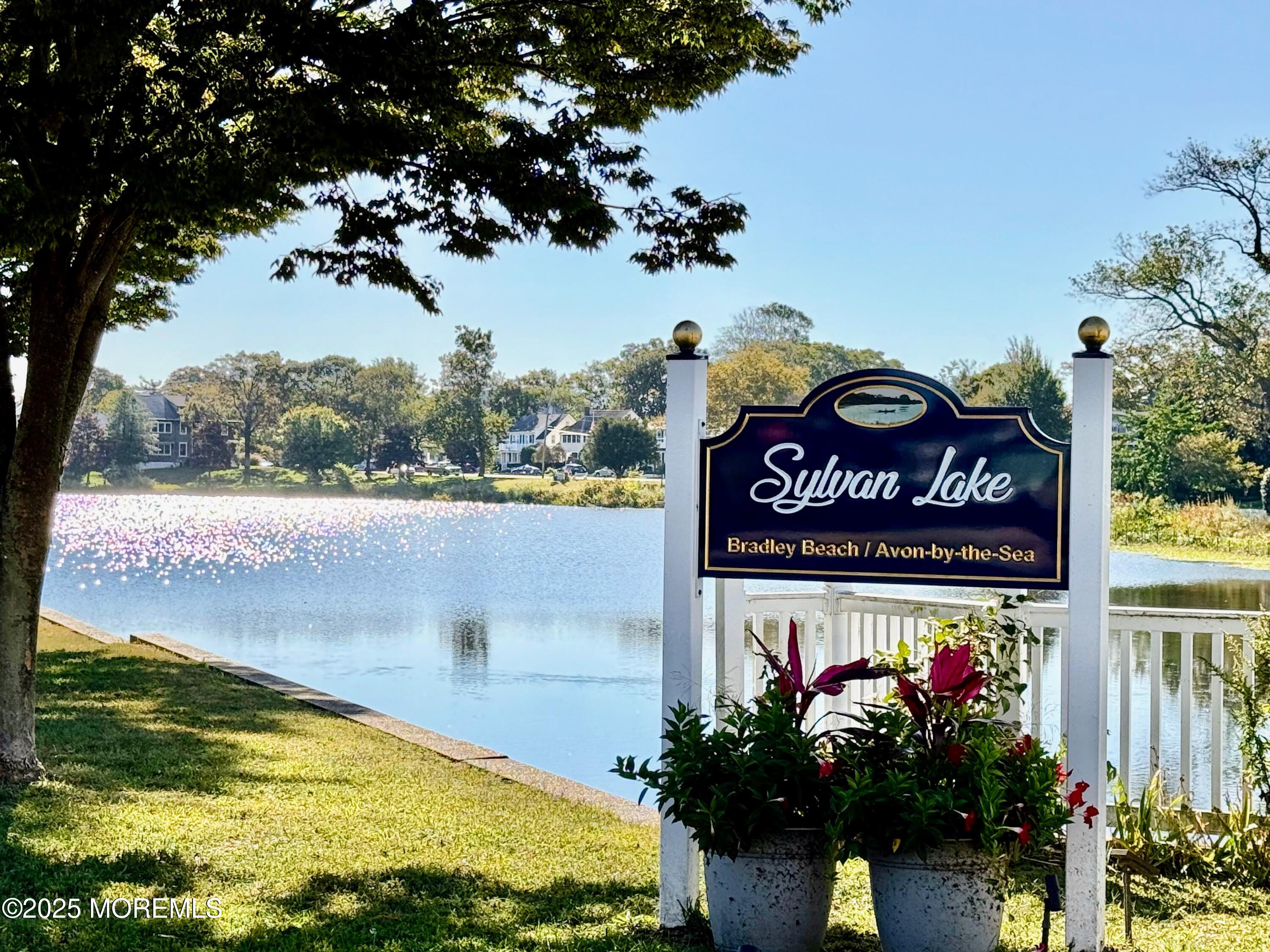 2 Main Street, Unit 308 Bradley Beach, NJ 07720 - Photo 22 of 31 a sign that is on the side of a building