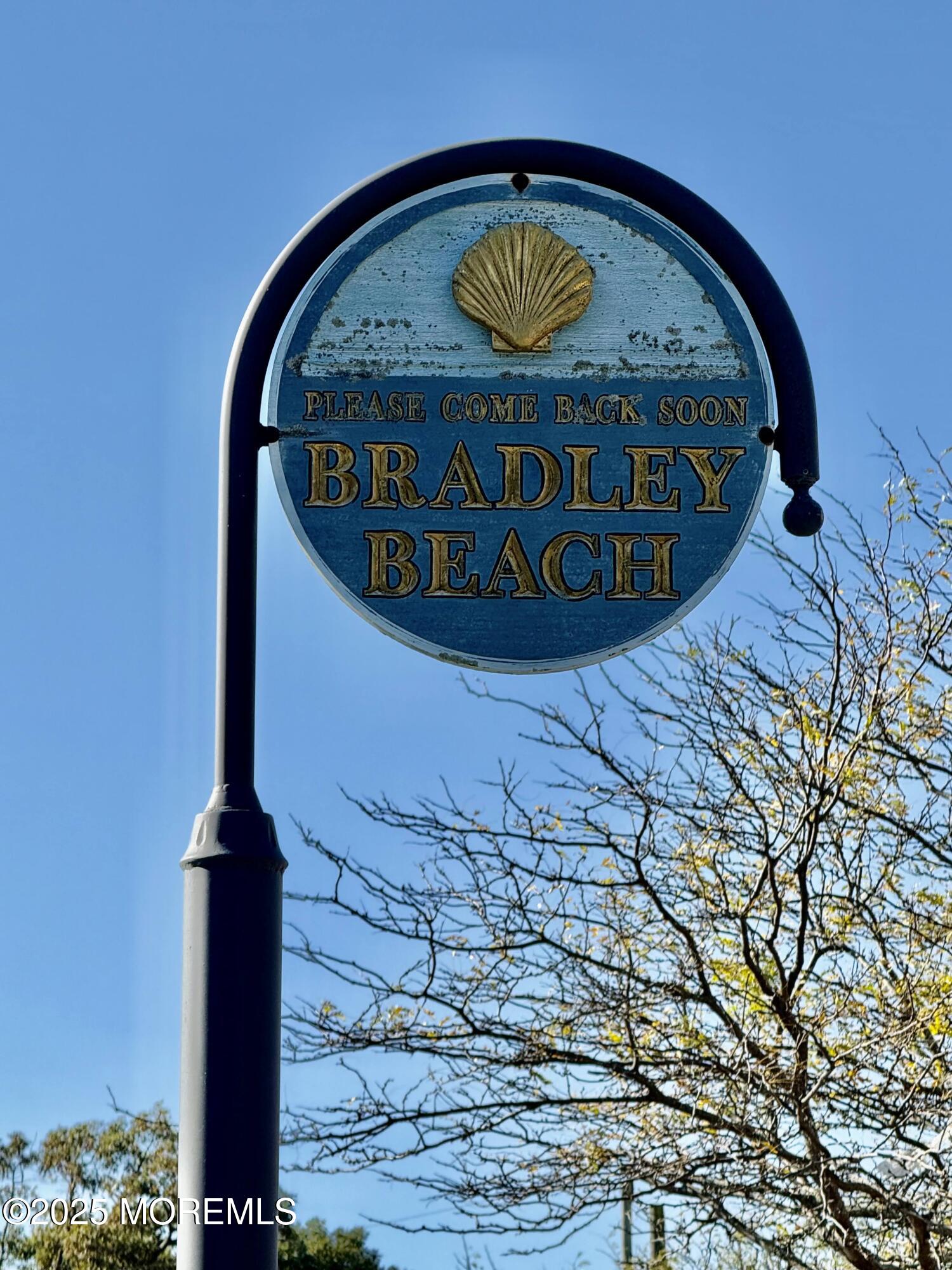 2 Main Street, Unit 308 Bradley Beach, NJ 07720 - Photo 23 of 31 a close up of a sign on a wall