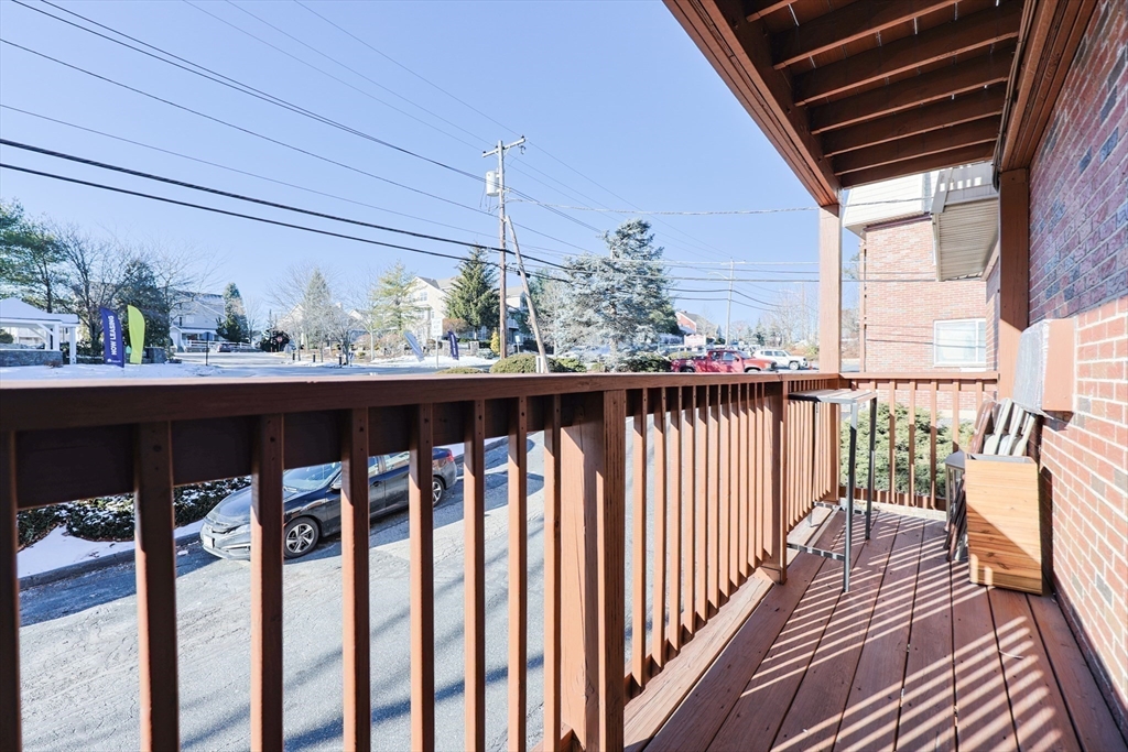 116 Boston Post Road East, Unit 101 Marlborough, MA 01752 - Photo 24 of 34 a view of a chairs and table in the balcony