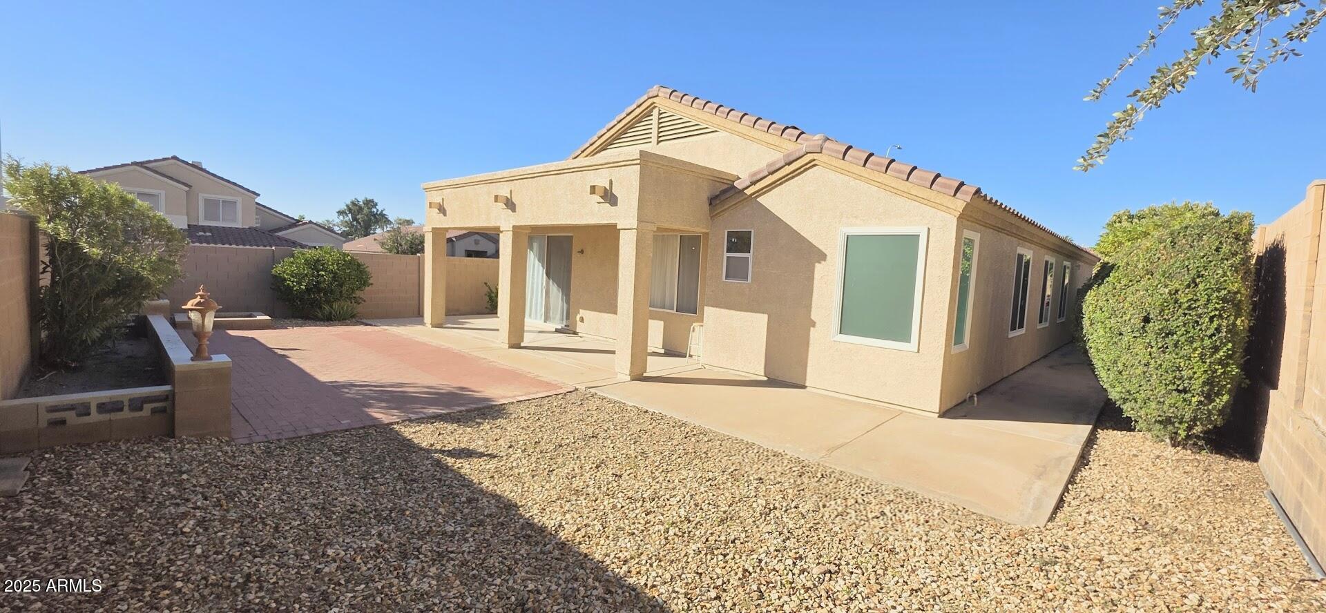 843 West Locust Dr. Chandler, AZ 85248 - Photo 23 of 23 a front view of a house with a yard
