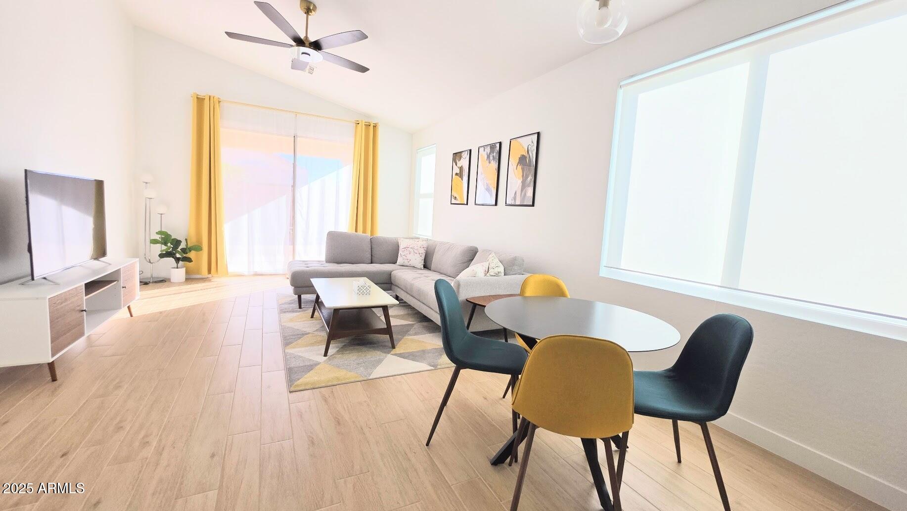 843 West Locust Dr. Chandler, AZ 85248 - Photo 4 of 23 a living room with furniture and a large window