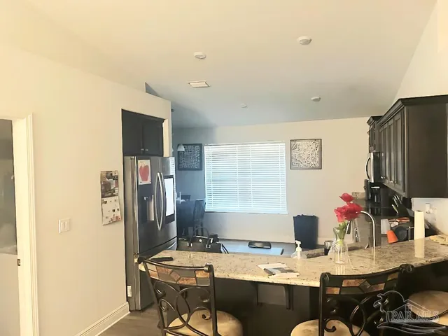 a workspace with furniture and window