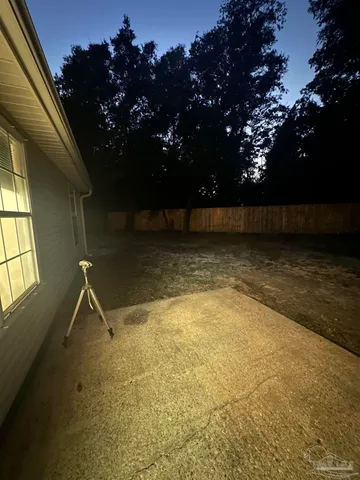 a view of room with a ceiling fan and a hardwood