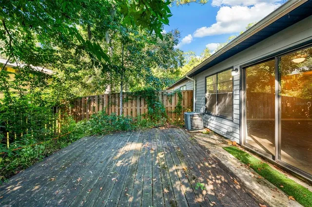 a view of a lake with a large trees