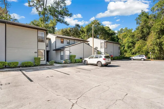 a view of a street with houses