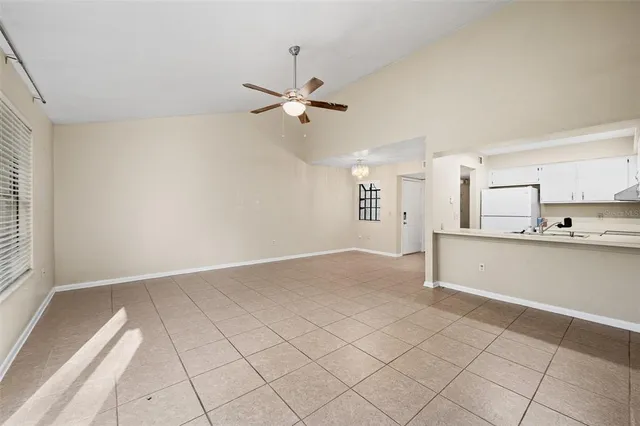 a view of kitchen with furniture and window