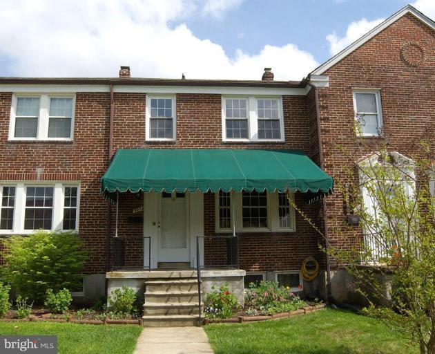 403 Greenlow Road Catonsville, MD 21228 - Photo 1 of 26 a front view of a house with garden